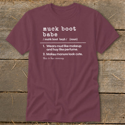 Maroon t-shirt with "muck boot babe" definition and definitions.