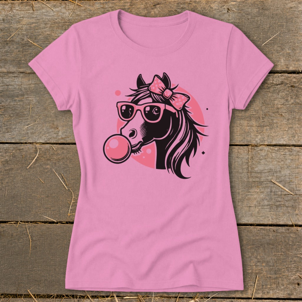 Pink t-shirt with graphic of a horse wearing sunglasses and blowing a bubble.