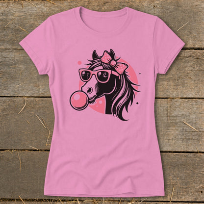 Pink t-shirt with graphic of a horse wearing sunglasses and blowing a bubble.