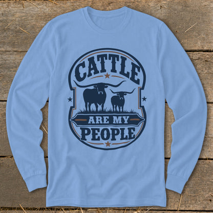 Light blue long-sleeve shirt with "Cattle Are My People" text and cattle graphic.