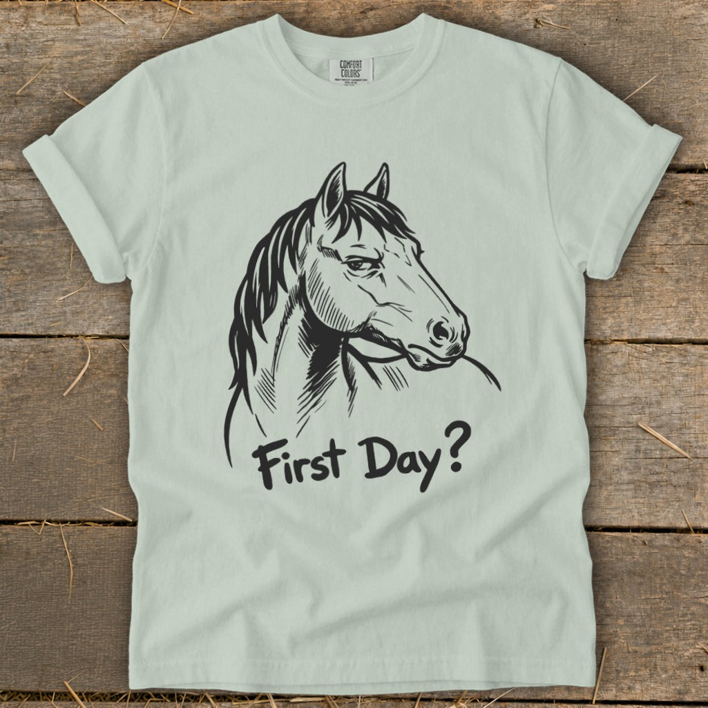 T-shirt with a black illustration of a horse's head and the text "First Day?".