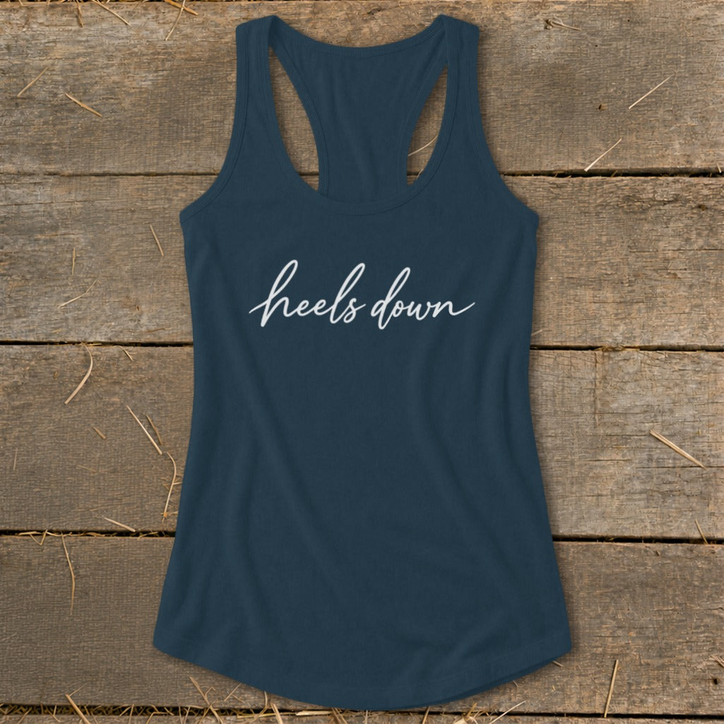 Navy racerback tank top with white script text "heels down"