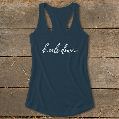 Navy racerback tank top with white script text "heels down"