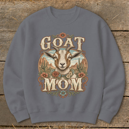 Goat Mom graphic on grey sweatshirt with desert landscape and flowers.