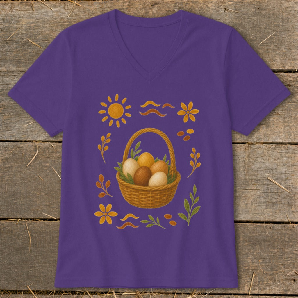 Purple t-shirt with Easter basket, eggs, sun, flowers, and leaves pattern.