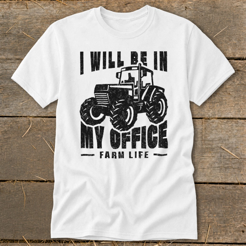 White t-shirt with distressed graphic of a tractor and text "I WILL BE IN MY OFFICE FARM LIFE".