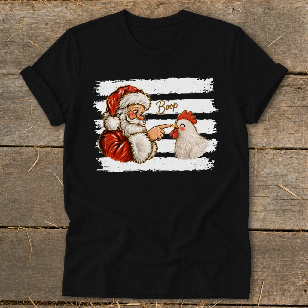 Santa booping a chicken with the word "Boop" on a black t-shirt.