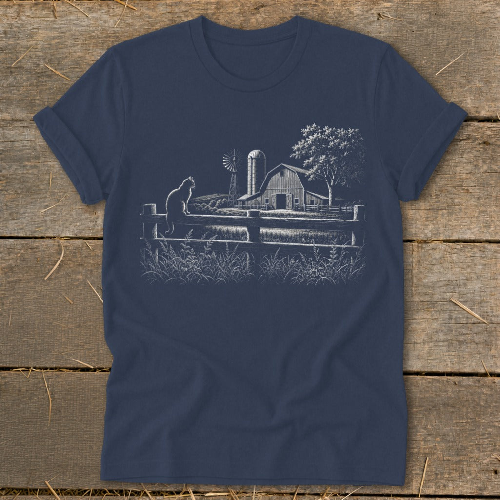 White line art of a barn, windmill, tree, fence, and cat on a navy t-shirt.