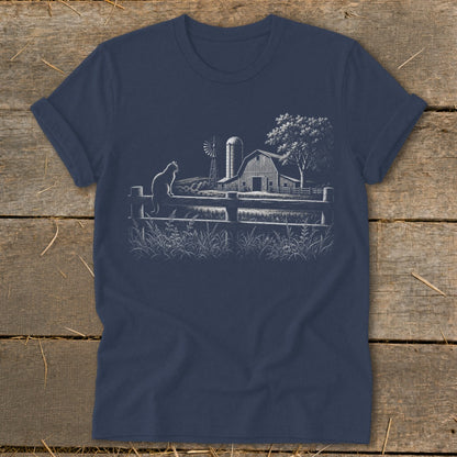White line art of a barn, windmill, tree, fence, and cat on a navy t-shirt.