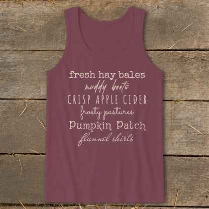 Burgundy tank top with "fresh hay bales muddy boots crisp apple cider frosty pastures pumpkin patch flannel shirts" text.