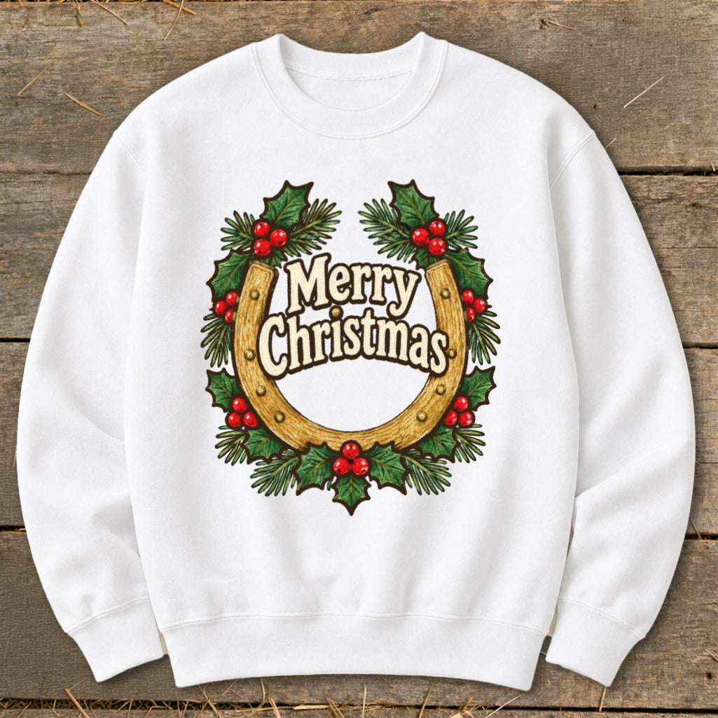 White sweatshirt with a horseshoe wreath graphic that says "Merry Christmas."