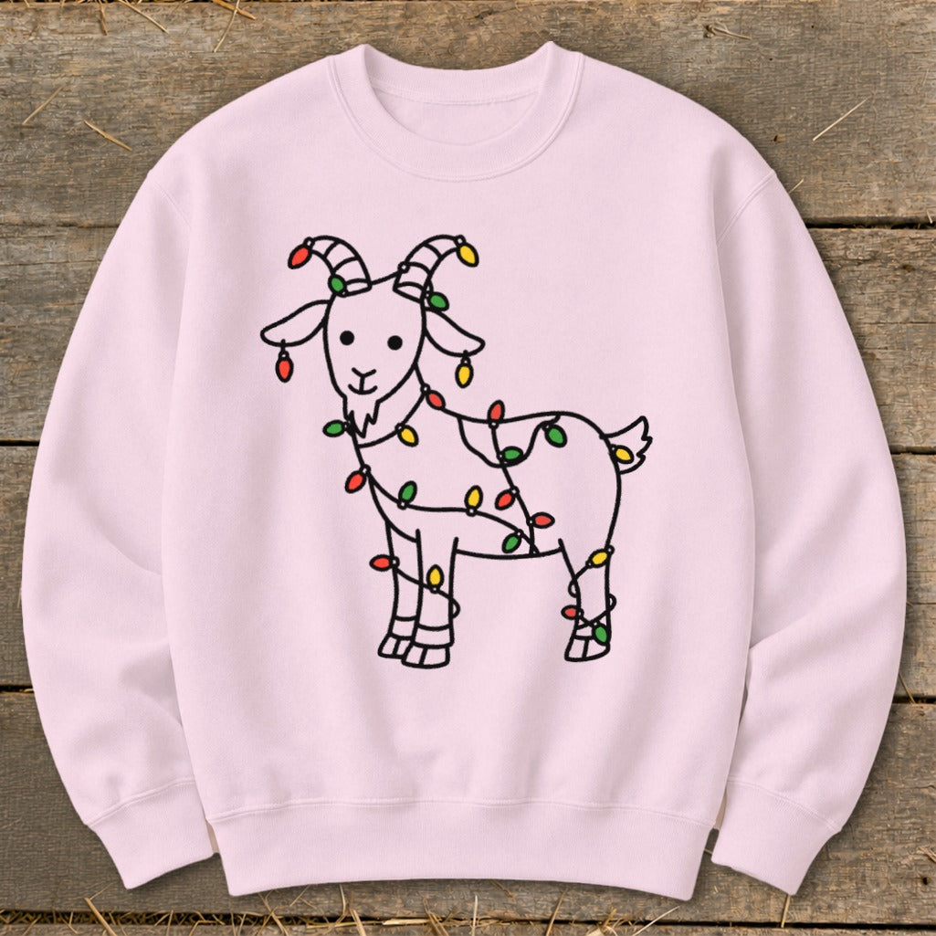 Pink sweatshirt with a line drawing of a goat decorated with colorful Christmas lights.