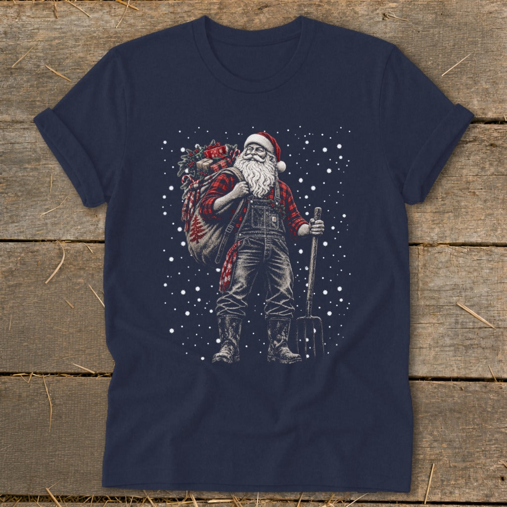 Santa Claus in overalls, plaid shirt, and boots holding a pitchfork with gift sack.