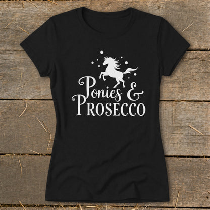 Black t-shirt with white graphic: a running pony above text "Ponies & Prosecco".
