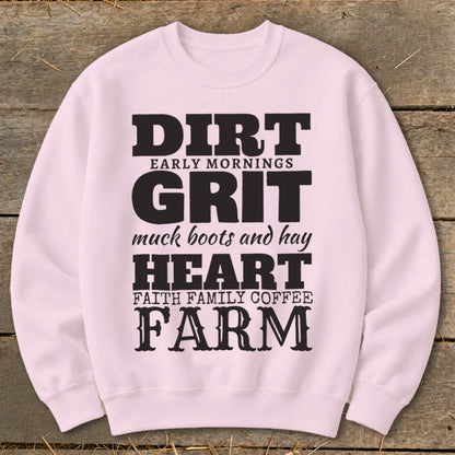Pink sweatshirt with "DIRT, GRIT, HEART, FARM" and related phrases in black text.