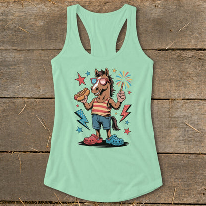 Horse wearing sunglasses and striped shirt, holding hot dog and sparkler.