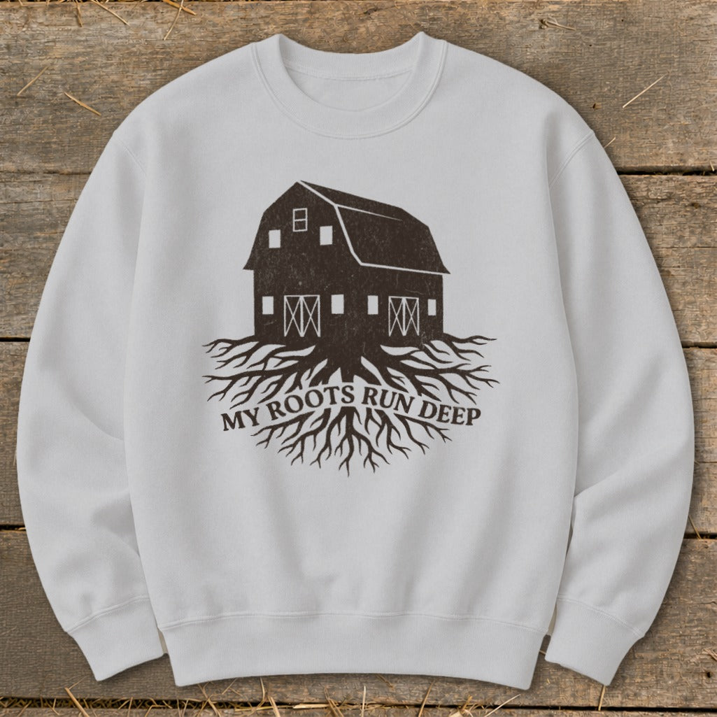 White sweatshirt with dark brown barn graphic and "My Roots Run Deep" text.