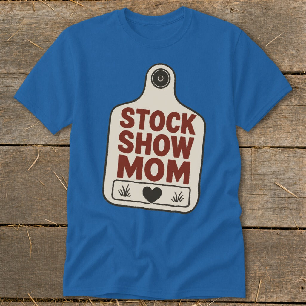 Blue t-shirt with a white tag graphic that reads "STOCK SHOW MOM."