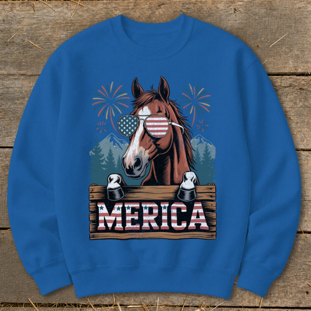 Horse wearing American flag sunglasses and saying MERICA with fireworks.