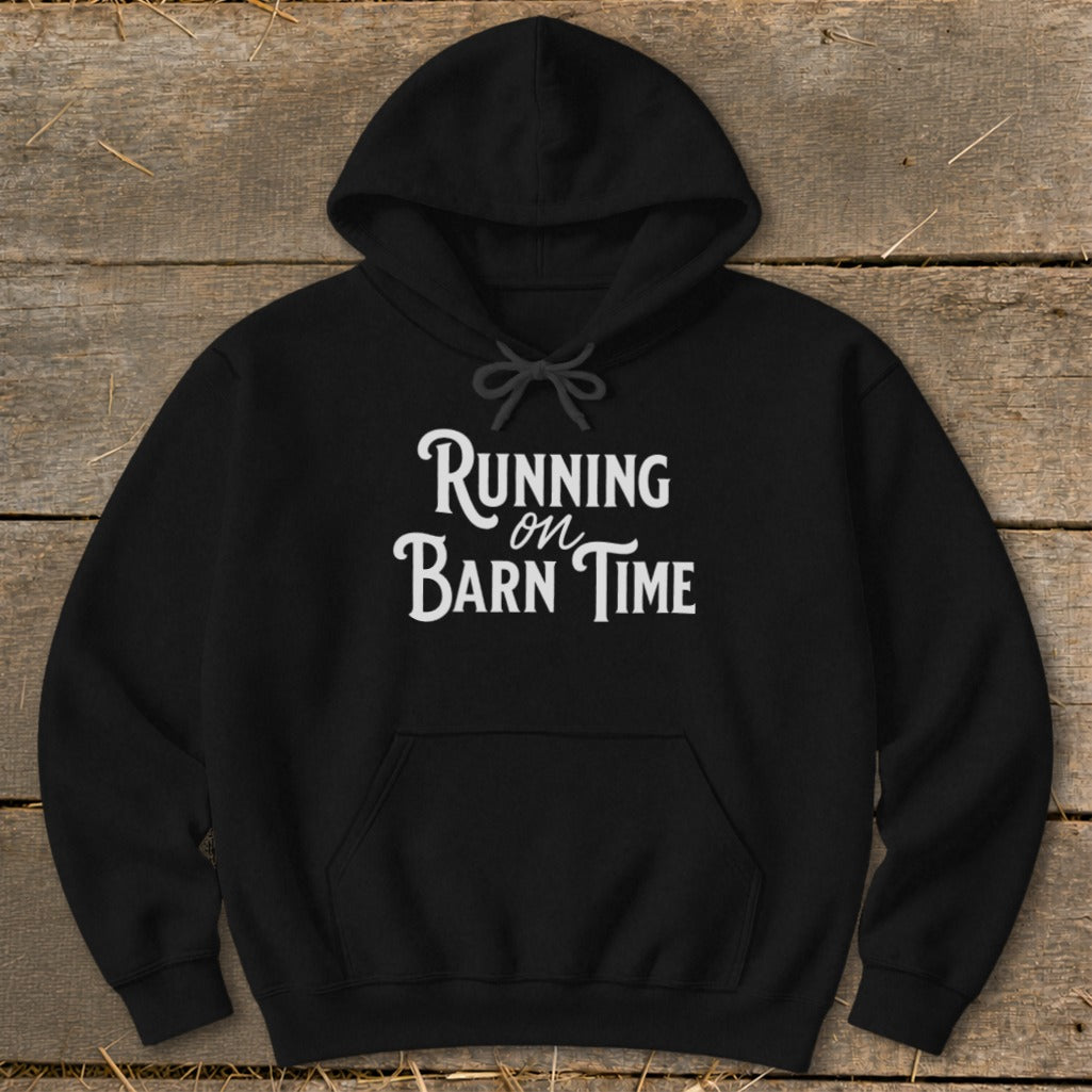 Black hoodie with white text "Running on Barn Time" centered on the chest.