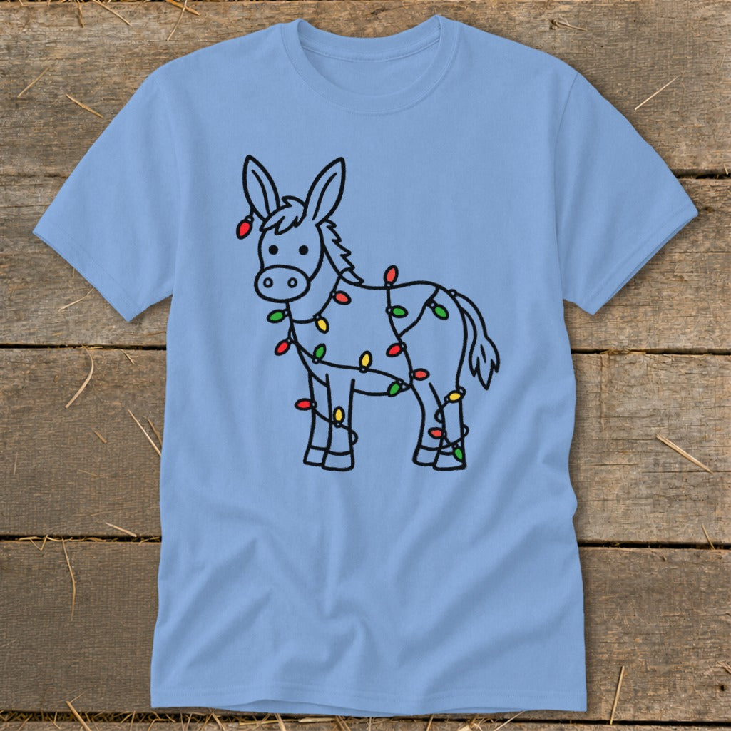 Light blue t-shirt with a cartoon donkey wrapped in colorful Christmas lights.