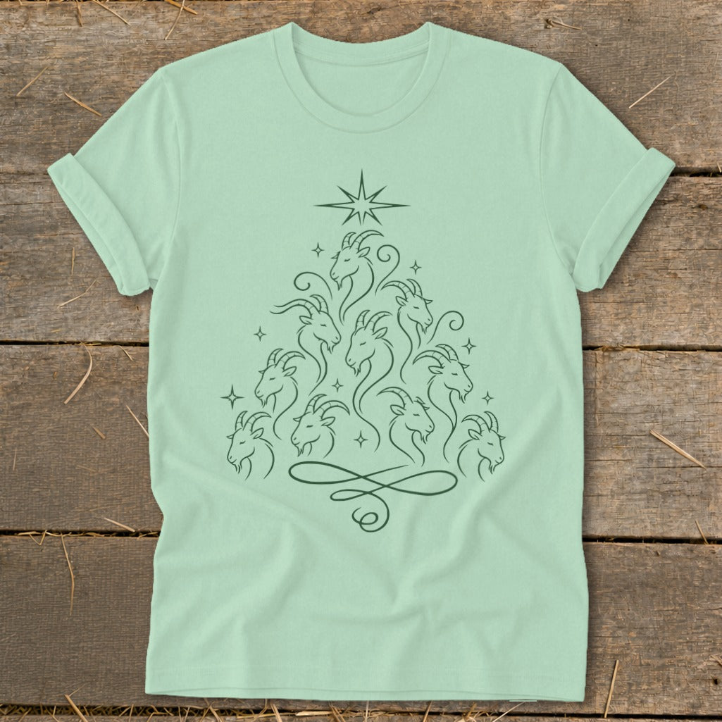 Light green t-shirt with a Christmas tree formed from many goats and a star.