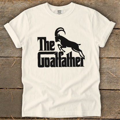 Cream t-shirt with "The Goatfather" text and a leaping goat graphic.