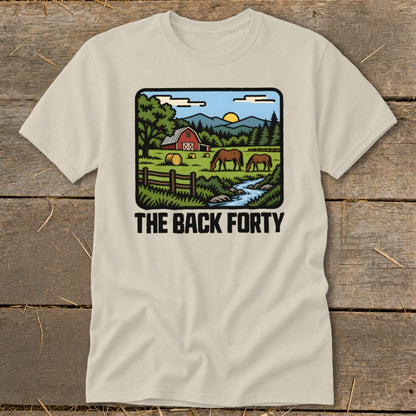 A beige crewneck t-shirt featuring a retro cartoon landscape illustration and the text The Back Forty.