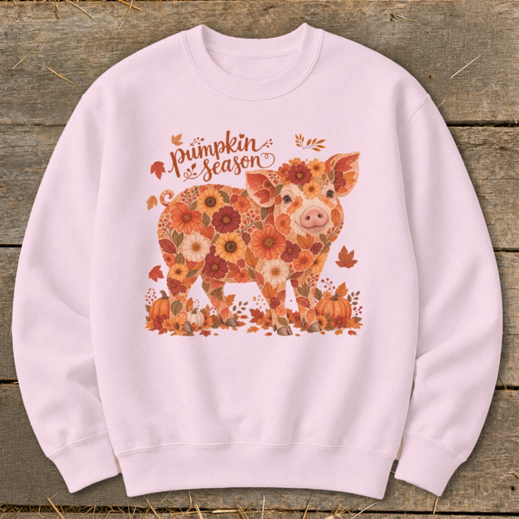 Pink sweatshirt with a floral pig and "Pumpkin Season" text.