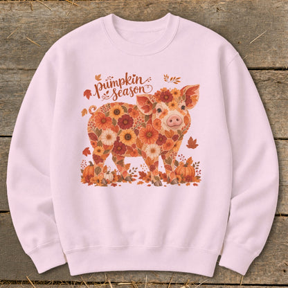 Pink sweatshirt with a floral pig and "Pumpkin Season" text.