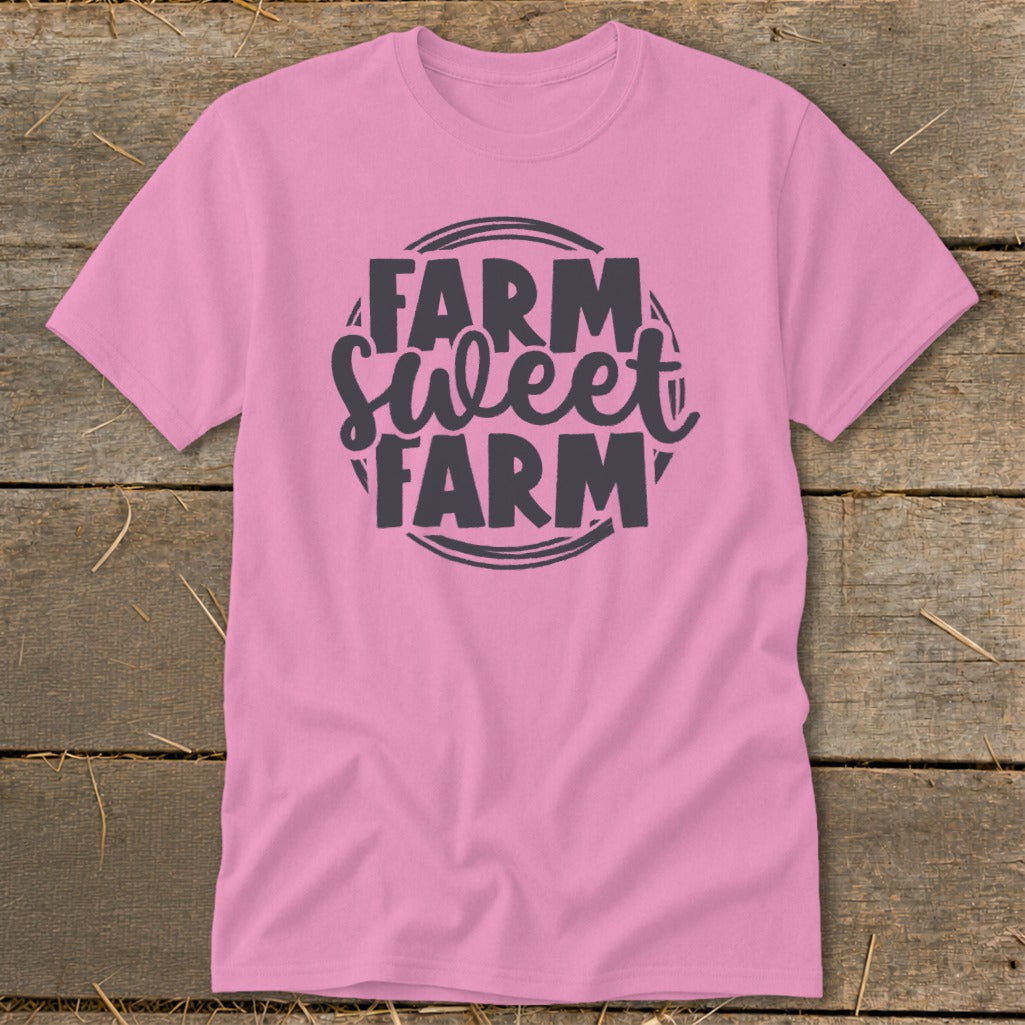 Pink t-shirt with "Farm Sweet Farm" text graphic in a circular design.
