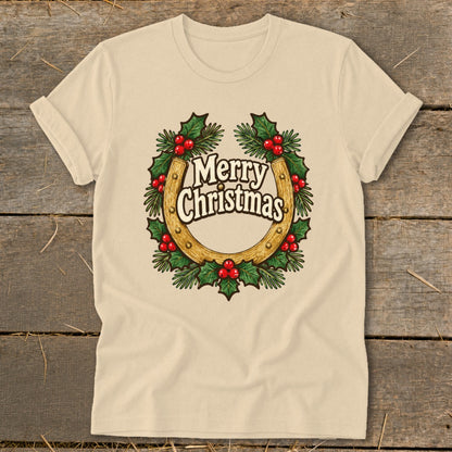 Beige t-shirt with a horseshoe wreath and "Merry Christmas" text.