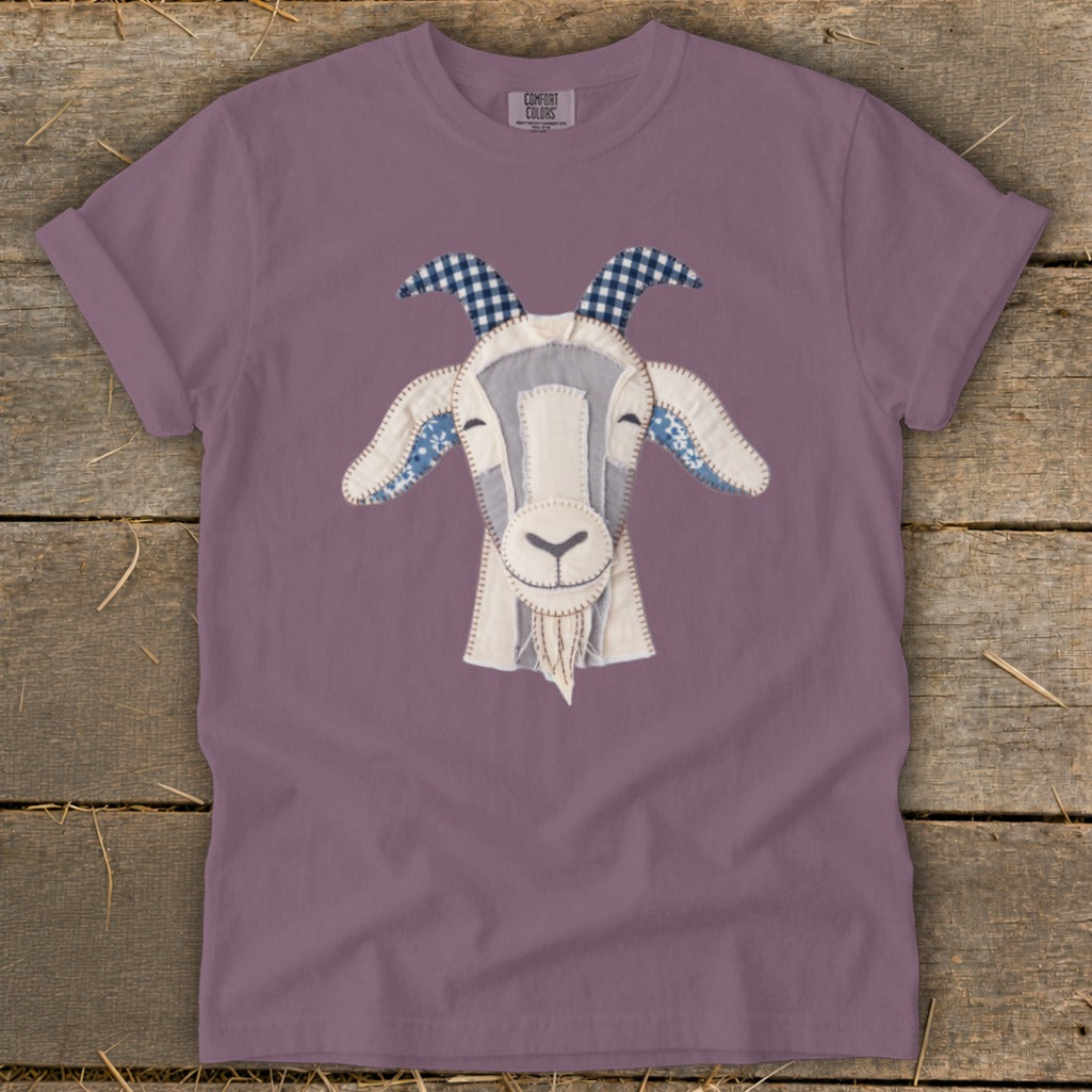 Purple t-shirt with applique goat head design and Comfort Colors tag.