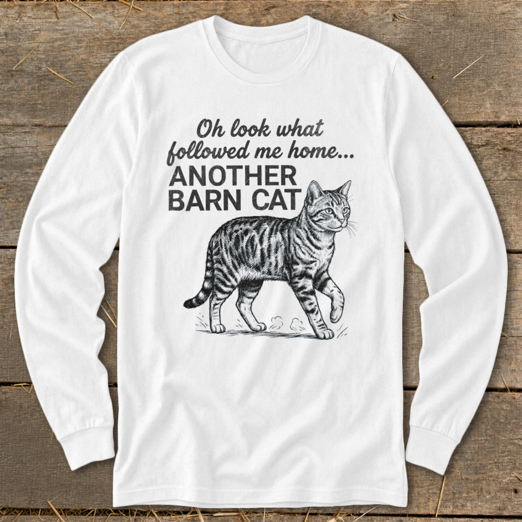 White long sleeve shirt with black text and illustration of a tabby cat.