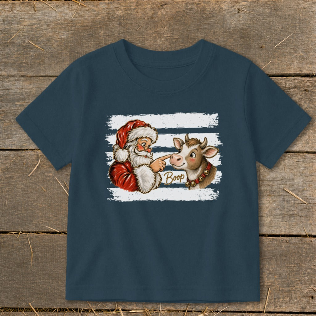 Santa booping a cow with the word "Boop" on a graphic with white stripes.