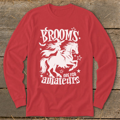 Red long sleeve shirt with "Brooms are for amateurs" witch on horse graphic.