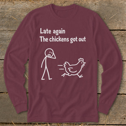 Maroon long-sleeve shirt with white text and cartoon of a person and running chicken.