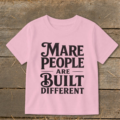 Pink t-shirt with black text that reads "Mare People Are Built Different".