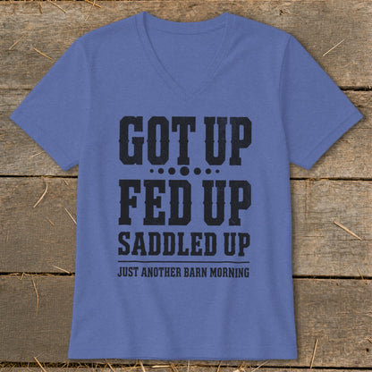 Purple t-shirt with black text reading "GOT UP FED UP SADDLED UP JUST ANOTHER BARN MORNING".