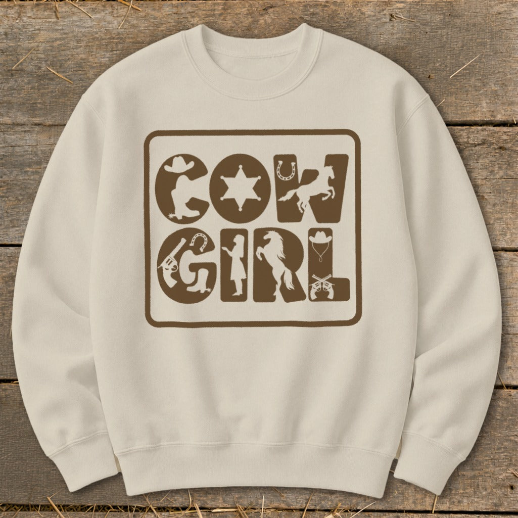 Crewneck sweatshirt with brown "Cow Girl" graphic featuring western-themed illustrations.