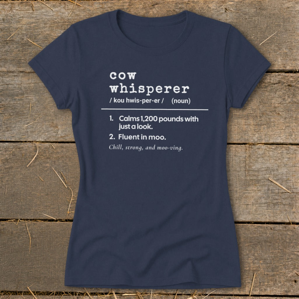 Navy t-shirt with "cow whisperer" definition: calms 1,200 pounds, fluent in moo.