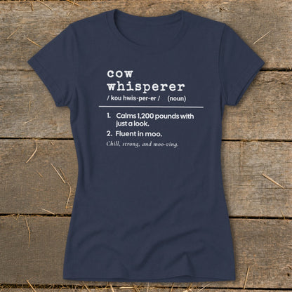 Navy t-shirt with "cow whisperer" definition: calms 1,200 pounds, fluent in moo.