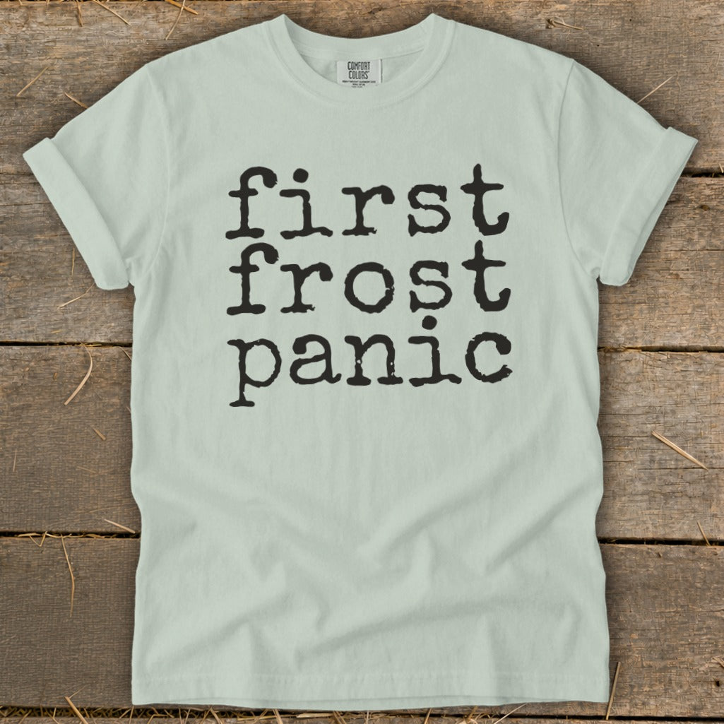 Pale green t-shirt with black text reading "first frost panic".