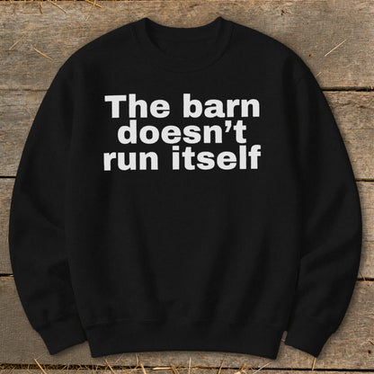 Black sweatshirt with white text that reads "The barn doesn't run itself".