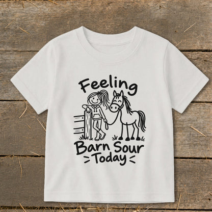 White t-shirt with cartoon girl and horse graphic and text "Feeling Barn Sour Today".