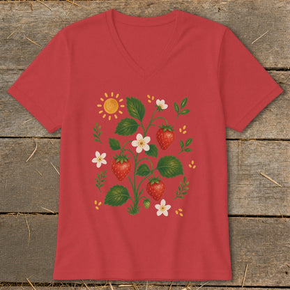 Red v-neck t-shirt with a whimsical strawberry plant illustration and a smiling sun.