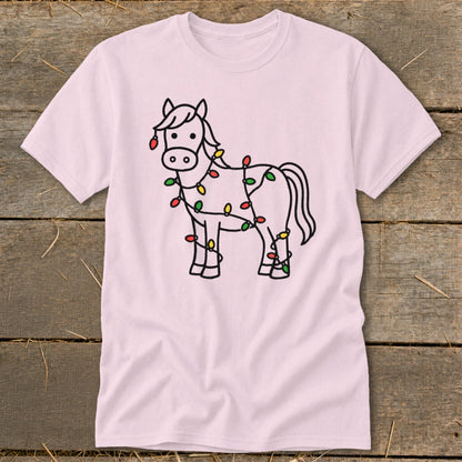 Pink t-shirt with a black outline drawing of a horse covered in colorful Christmas lights.