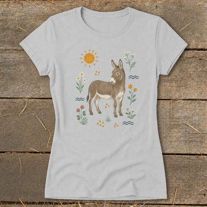 Light gray t-shirt with a watercolor-style illustration of a donkey surrounded by flowers and a sun.