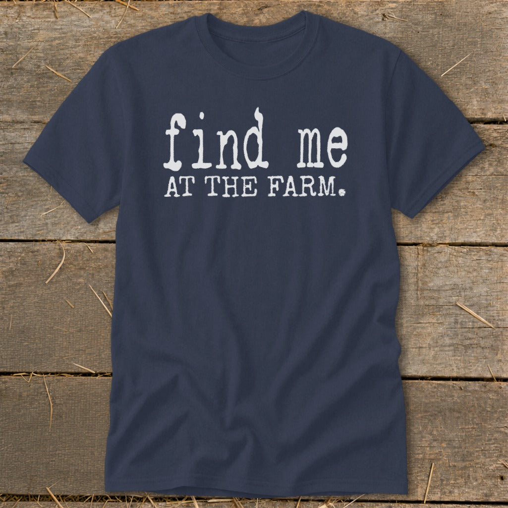 Navy t-shirt with white text that says "find me AT THE FARM."