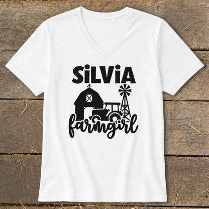 White t-shirt with "SILVIA farmgirl" text and farm graphics.